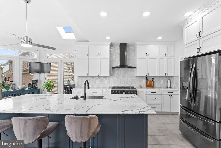 Welcome to 8605 Woodwren Terrace, a stunning single-family home perfectly situated on a desirable corner lot in a quiet cul-de-sac in sought-after Fairfax Station. This is the home you have been waiting for!

Featuring 5 spacious bedrooms and 4 full bathrooms, 1 flex room, home gym, private office and much more this beautifully maintained home offers an exceptional blend of elegance, comfort, and functionality. 

Step inside to be greeted by this spectacular 5,000 sqft home with a grand foyer with a striking curved staircase and abundant natural light throughout. The main level includes a private office conveniently located next to a full bathroom, a formal living room, and an elegant dining room, perfect for entertaining.
The heart of the home is the recently renovated gourmet kitchen, showcasing quartz countertops, high-end cabinetry, and stainless steel appliances. The kitchen opens seamlessly to a warm and inviting family room with a stunning stone fireplace, and flows into a bright solarium—ideal for relaxing or entertaining.
From the family room, step out onto the expansive deck overlooking a fully fenced backyard, perfect for outdoor gatherings.
Upstairs, you’ll find four generously sized bedrooms, including a luxurious primary suite with two walk-in closets and a spa-like bathroom featuring a skylight that fills the space with natural light. The additional bedrooms share a well appointed hall bathroom, and a conveniently located laundry room completes the upper level.
The fully finished walkout basement offers incredible versatility with a home gym, a large second family room, one additional bedroom, a full bathroom, a second laundry area, and a flexible bonus room that can easily be converted into an additional bedroom—ideal for guests, a home office, or multi-generational living.
Additional highlights include a two-car garage and a prime location in the beautiful Crosspointe community, known for its amenities and convenience. Don’t miss this exceptional opportunity to own a remarkable home in Fairfax Station!