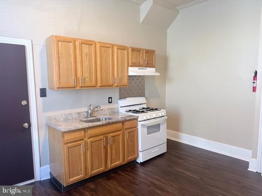 Welcome to your new home in North Philadelphia! This charming Studio, one bath multi-family residence spans 520 square feet, providing a cozy yet functional living space.

Key property features connect the kitchen and bedroom. The kitchen boasts wooden cabinetry and a sleek granite countertop, equipped with a gas stove and oven. Natural light floods the space through multiple windows, enhancing the welcoming atmosphere. Modern dark laminate flooring runs throughout, while radiator heating ensures warmth during the colder months.

Utilities include water, with heating included in the rent. Located just a short drive from several restaurants, department stores, and renowned educational institutions, this property is also close to parks like the Philadelphia Zoo. The landlord does not provide a refrigerator. First, last month, and security to move in with an application fee. Credit and background check. Don’t miss out on this opportunity—schedule a tour today and discover your new home!
