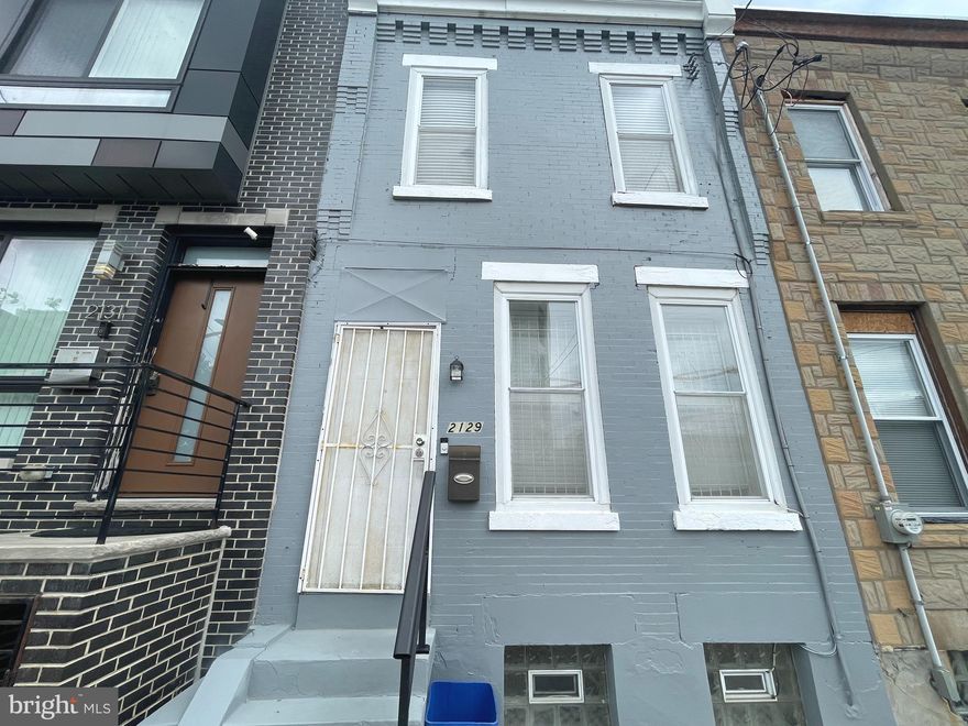 A great property to add to your rental portfolio, or owner-occupants, welcome home to this three bedroom nicely done renovated townhome. Situated within walking distance of the main campus of Temple University, this townhome offers a main level that has a bedroom, living room and an upgraded kitchen. For convenience, the home has a stacked washer and dryer on the main level,  and remote controlled ceiling fans. There is a quaint fenced-in backyard that is perfect for a grill and outdoor seating. The lower level is a full finished basement with a half bath. The basement has glass block windows which bring in lots of natural light.  Head up to the second level of this home and there are two additional bedrooms, and a full bathroom. The seond floor rooms also have ceiling fans. This home has central air conditioning. The property has beautifully finished hardwood floors throughout. This house is situated next door to new construction, and there is a new development being erected across from the property. Seller will consider providing seller's assistance with reasonable offer. The Temple University area has a walk score of 90. The home is close to public transportation,  restaurants, food trucks and other community amenities. Schedule your showing today!