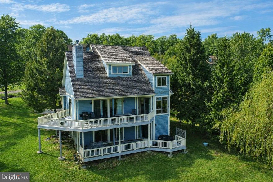 Take a look at this awesome chalet style home with stunning lake and mountain views. Featuring 4 bedrooms and 3.5 baths, this home is perfect for entertaining. This ski-in and ski-out property is located in the highly coveted Highline community that sits very close to the Wisp Ski Area and ASCI. Two fireplaces, one in the main level living room and one in the lower level recreation room. Main level primary suite with incredible lake views. Loads of glass to enjoy the views and two levels of decking with hot tub on lower level deck. This property is an established vacation rental "On Eagle's Wings". RAILEY REALTY IS NOT THE CARETAKER OF PROPERTIES LISTED BY IT. DURING INCLEMENT WEATHER CONDITIONS, PROSPECTIVE PURCHASERS AND THEIR AGENTS ASSUME ALL LIABILITY ASSOCIATED WITH OR BY WEATHER AT THE PROPERTY.