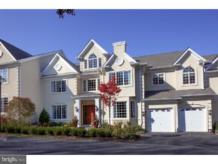 This dazzling custom home, meticulously handcrafted by Orleans Development, was awarded the Philadelphia Magazine Design Home of 2013. Grand scaled living & entertaining spaces include a dramatic three-story Reception Hall with architecturally significant staircase, formal Living Room with spectacular home bar, elegant Dining Room, stunning chef's Gourmet Kitchen, Breakfast Room, dramatic two-story Family Room & handsome Library. The second floor is highlighted by an expansive Master Suite with luxurious His & Her Baths, fireplace & Sitting Room. A Bedroom Suite, Exercise Room and abundant storage is found on the third floor. Designed for relaxation & comfort, the walk-up Lower Level has nearly 2,000 square feet and features a Recreation Room, large wine cellar & abundant storage. An elevator services all four levels. The expanded Trex Deck overlooks lush grounds that include a gas fire pit.