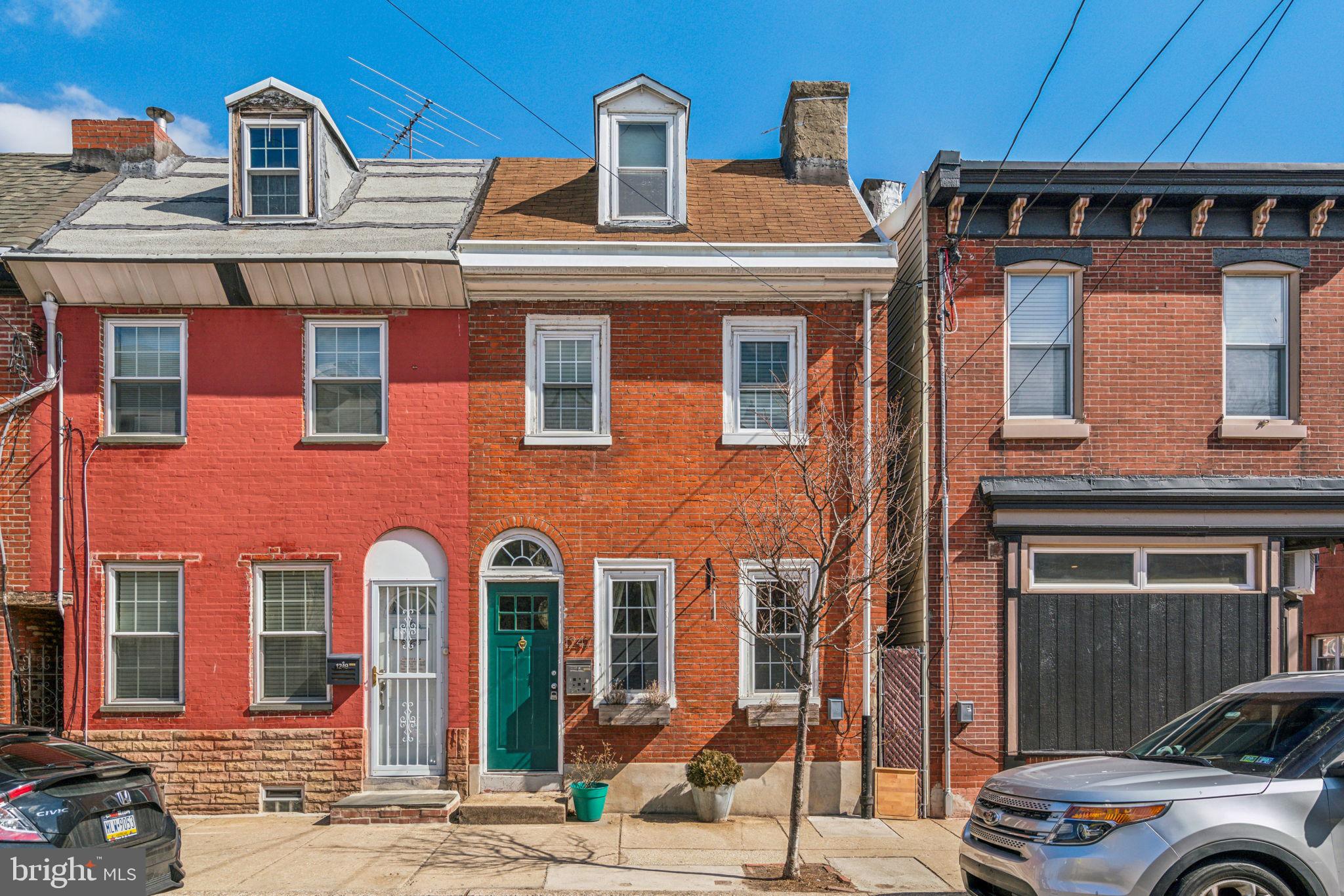 BEST AND FINAL OFFERS DUE BY TUESDAY, 03/11/25. Welcome to 1247 E Palmer Street, a stunning home in the heart of Fishtown! As you enter, you’ll be greeted by the living room with hardwood floors, exposed brick walls, decorative fireplace, and large windows allowing tons of natural light. The kitchen features stainless steel appliances, farm house sink, and white cabinetry for storage. Then step outside to the back patio with beautiful garden space and stone tiles, perfect for entertaining guests. Upstairs, you’ll find two large bedrooms and a fully refinished bathroom with contemporary tiling and nickel finishes. The unfinished basement offers tons of extra storage space and has new waterproofing including new sump pump. This home also has a new furnace/HVAC, new water heater, and new water line from the house to the street. This property is only a few steps away from local shopping, restaurants/bars, The Lederer Pool, playgrounds, parks, I-95, Girard Ave, and Frankford Ave, this home is in a perfect location. Schedule your showing today!