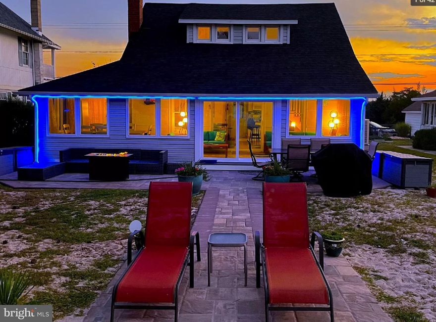 Welcome to 399 Bay Ave in Slaughter Beach, a rare opportunity to own a 3-bedroom, 2-bath bayfront coastal retreat with proven income potential. Perfectly positioned along the Delaware Bay, this home offers unobstructed water views and breathtaking sunrises just steps from your door.

Currently operating as a successful short-term rental, this property presents a compelling opportunity for both investors and lifestyle buyers. Whether you’re seeking immediate rental income or a personal coastal escape, this home delivers flexibility, performance, and experience.

Offered fully furnished and truly turnkey, this property includes all furniture, appliances, décor, and household items—allowing for immediate enjoyment or seamless continuation as a short-term rental.

Inside, the home features a bright, open layout designed to maximize natural light and coastal views. A sun-drenched, multi-functional living space serves as the heart of the home, seamlessly blending lounge, dining, and entertaining areas—ideal for gathering with family and guests. Thoughtful updates and coastal finishes enhance both comfort and style.

Outdoor living is equally inviting, offering space to relax, dine, and take in the peaceful waterfront setting. Located in a quiet, low-density coastal community known for its natural beauty and protected wildlife, Slaughter Beach offers a rare sense of tranquility—while remaining just a short drive to the shops, dining, and beaches of Lewes and Rehoboth Beach.