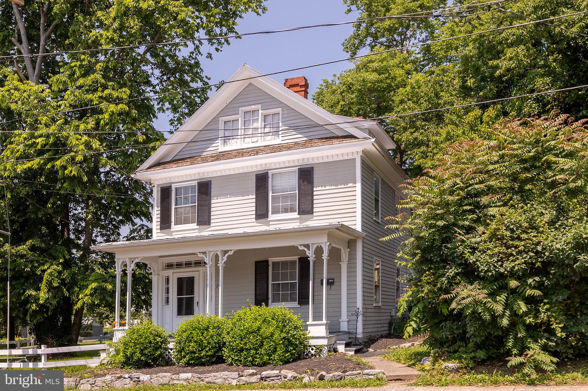 Historic Strasburg Colonial charm abodes with loads of living space, including formal living and dining areas, four bedrooms(total), two baths, hardwood flooring, original hand-cut wood exposed beams, and built-ins. The bonus room can be divided into a separate loft or family living quarters/apartment. The grand front porch is one of the favorite sitting areas for small-town relaxing evenings. The house is centrally located in the quaint old town area of historic Strasburg. The proximity to dining, library, post office, and convenience shopping is only a short distance away in town. Two options for living: live in the main house and rent out the loft!