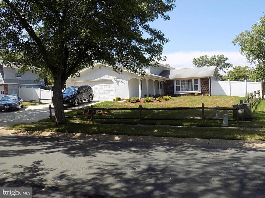 Gorgeous, unique Split Level home totally remodeled! Expanded Kit/Dining Rm w/French Doors to Screened-in Porch. 2 car Garage w/extended driveway leading to detached Garage/Shed in totally fenced backyard. Bump out in Fam Rm.  Woodstove insert in Fam Rm. Nicely Landscaped. Garden in rear. Cul-de-sac location. Built in desk & extra cabinets in Kitchen/Dining Rm. Jetted tubs in 2 Bathrooms.