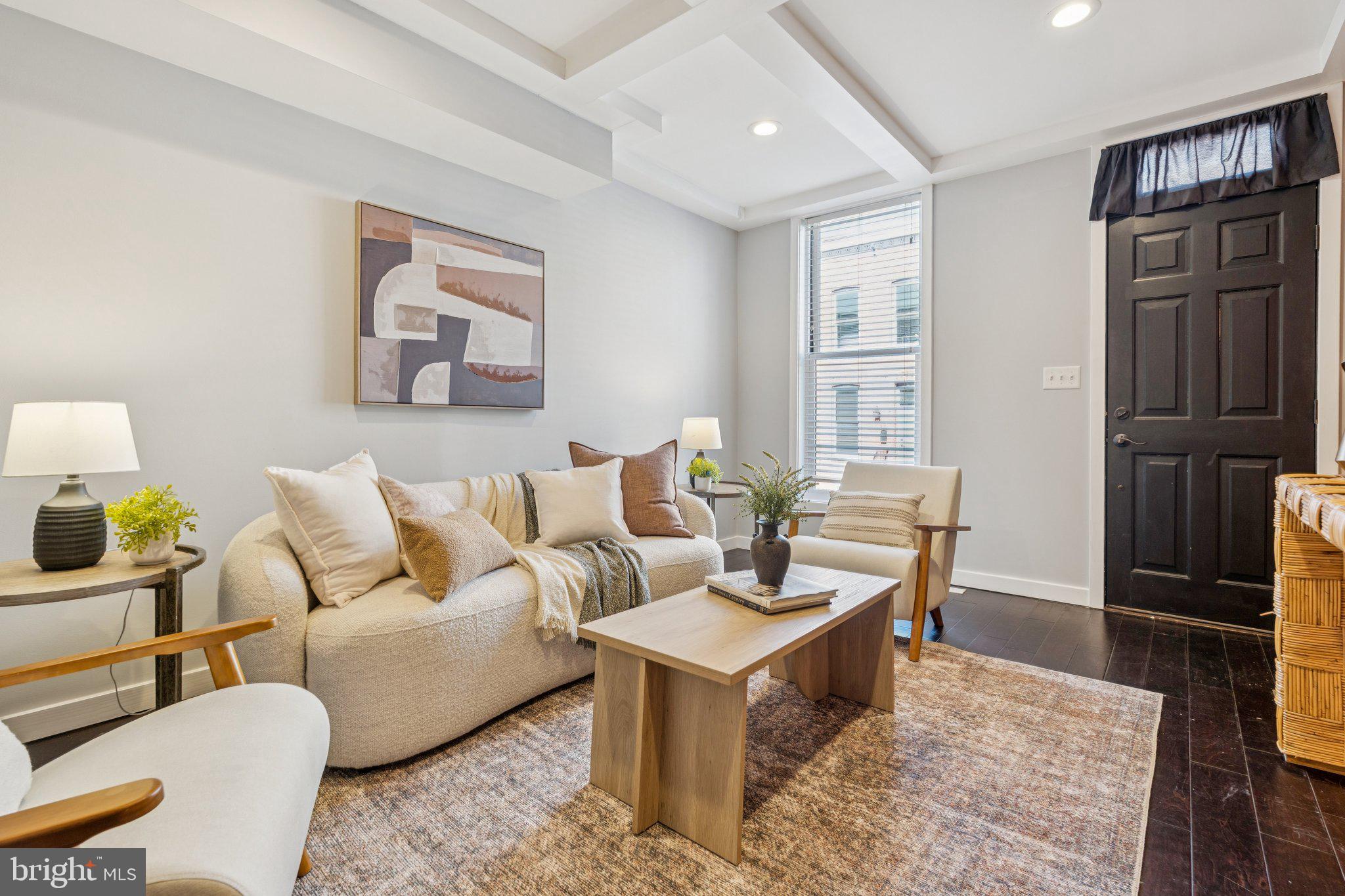 Welcome to 1431 Richardson Street – a beautifully renovated Locust Point rowhome with parking and 3 years remaining on the CHAP TAX credit! Step through the front door to find a bright and inviting living space with hardwood floors and timeless exposed brick, leading into a modern kitchen with quartz countertops, stainless steel appliances, and a convenient first-floor half bath. Upstairs, you’ll find two bedrooms, two full bathrooms, laundry, and access to a private rear deck—perfect for relaxing or entertaining. The unfinished basement provides excellent storage space. Ideally located just steps from Fort McHenry and Latrobe Park, and only minutes from I-95, Federal Hill, and Downtown Baltimore, this home offers the perfect blend of charm, convenience, and value.