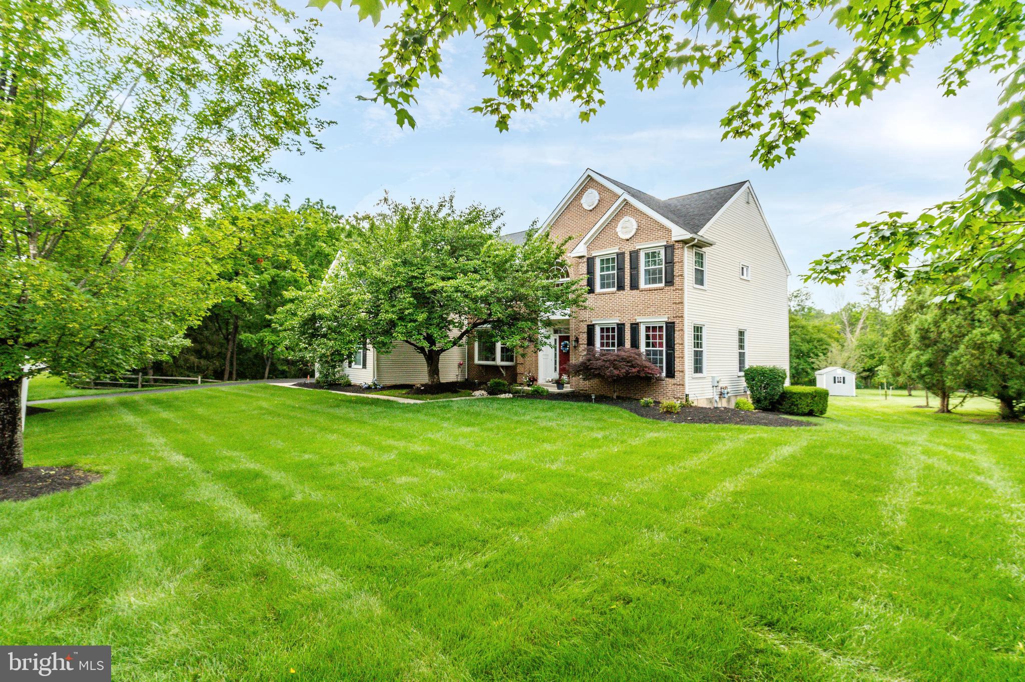 Welcome to this stunning 5-bed, 4.5-bath Colonial in the highly sought-after Guidi built, Gwynwood Pond, located in North Penn School District—offering space, luxury, and comfort on one of the most private lots in the neighborhood. Inside, you'll find gleaming hardwood floors, soaring ceilings, and natural light pouring through oversized windows. The family room wows with a floor-to-ceiling gas, stone fireplace and a dramatic window wall overlooking a large, green backyard—perfect for entertaining or quiet summer nights. The kitchen features a large island, butler’s pantry, white cabinetry, stainless steel appliances, large sink with cathedral ceiling above, and flows into your eat in kitchen with direct access to a raised deck overlooking the backyard. Dual staircases, a first-floor office, formal dining room, living room, and a 3-car garage add everyday convenience.
Upstairs, find 4 spacious bedrooms and 3 full baths—including a massive primary suite with dual walk-in closets, sitting room, and primary bath. Downstairs, the fully finished basement includes a 5th bedroom, full bath, new sliding door to a covered porch leading to the yard, and endless potential for a rec room, guest suite, or gym. With 2 HVAC systems, a 75-gallon hot water heater (2022), and a BRAND NEW ROOF under a 25-year transferable warranty, peace of mind comes standard. Bonus: All appliances and garage fridge stay!
Located just minutes from Routes 309 & 202, SEPTA rail lines into center city Philadelphia, and major shopping centers, you’ll also enjoy easy access to local gems like Spring Valley Park, Montgomery Mall, Lifetime Fitness, Trader Joe’s, and top-rated restaurants. This is more than a home—it’s a lifestyle. Come see it today before someone else calls it theirs!