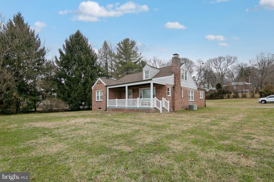 Beautifully UPDATED 4 bedroom home sits back from the street on a LARGE, level, corner lot! Enjoy the removed, quiet neighborhood location, yet still be close to great Hunt Valley shopping, commuter routes and desirable schools! The updated kitchen/dining area boasts porcelain tile, GRANITE counters, recessed lighting, breakfast bar and plenty of space for a large dining table.  The living room features a cozy, brick surround wood burning FIREPLACE and is flooded with natural light. The upper level features the spacious MASTER SUITE complete with a recently updated full bathroom. An additional updated full bathroom is located on the main level along with 3 additional bedrooms. The full basement is PERFECT for storage, workshop space or is ready to be finished if you desire EVEN MORE living space! Additional features include newer carpet, roof and heating & AC...truly MOVE-IN READY!  Call today for more information and to schedule a private tour!