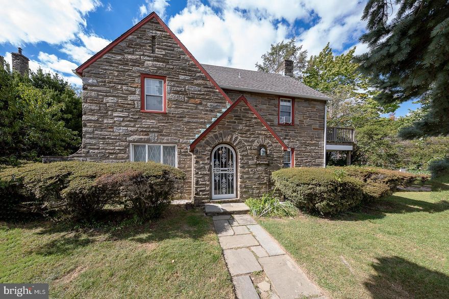 Fabulous opportunity to own a 5 bedroom 4 fully renovated bath Stone House in  desired East Oak Lane.  Enter into the center hall with an oversized living room to the right and a formal dining room to the left that leads into the breakfast room and the newly renovated kitchen with granite counter tops, stainless appliances and gas stove.  At the end of the center hall is a library/den.  Oak stairway leads to the 2nd floor where you will find 4 large bedrooms.  Two bedrooms are ensuite and the other 2 are served by a jack and jill bathroom.  The upper level has an additional bedroom with a full bath with a claw foot tub.  The lower level is partially finished with a newly renovated powder room.  With the fabulous hardwood floors and the fully renovated baths.  Side covered porch and huge rear patio.  Private drive with garage. You must see this house to appreciate the true charm that it offers!