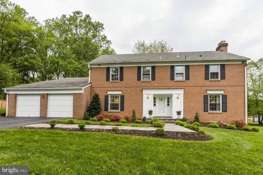 New price! Sunny, light filled 4 story brick colonial. 5 bedrooms, 4 full baths, 2 half baths, sited on a lovely corner lot.  Totally renovated with an eat-in kitchen, up to date baths, beautiful hardwood floors.   Meticulously well maintained with all new fencing (2015), new furnace (2015), new hot water heater (2014). Located just three blocks off Bradley & Burdette behind Woods Academy.