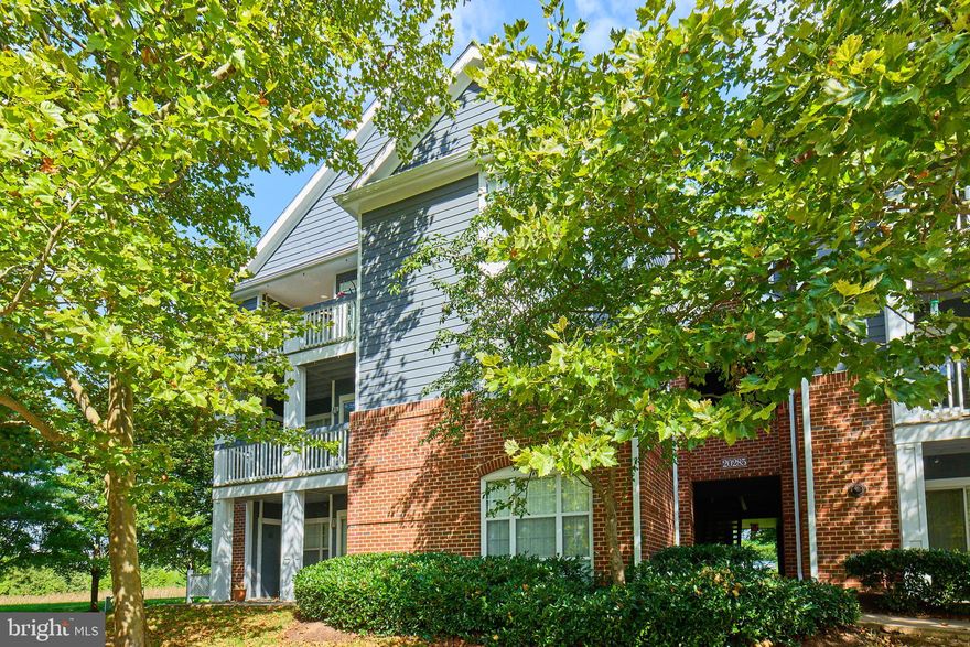 Move-in ready 2 bedroom and 2 full bath condo available for immediate occupancy! Freshly painted. New blinds. Recessed lighting. Luxury vinyl plank flooring throughout the unit with carpet in the bedrooms. This Cameron model has a light-filled open floorplan and includes a spacious living room with gas fireplace, separate dining room, kitchen featuring gas cooking and Stainless Steel appliances, and in-unit laundry. The primary bedroom has a large walk-in closet, ceiling fan/light, and private bathroom with tub/shower and large vanity. The secondary bedroom has a walk-in closet, ceiling fan/light, and easy access to the full hall bathroom. Relax on your private balcony facing common area grass/trees! There is plenty of unassigned parking for you and your guests. This unit is located on the top/3rd floor. Community amenities include an outdoor pool, fitness room, and community center. Excellent commuter location right off Route 7. Walk to GWU Virginia Science & Technology Campus and University Commerce Center. Close proximity to popular Bles Park w/ fishing, natural trails, sports fields, and One Loudoun with its many shops, restaurants, and entertainment (Trader Joe's, Barnes & Noble, Alamo Drafthouse Cinema, iFly, TopGolf, etc.). No pets and no smoking. Rent includes water/sewer, trash. Qualifying income is 75K+ with minimum 700+ credit score.