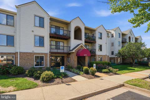 Photo of 8372 Buttress Ln #102, MANASSAS, VA 20110 (MLS # VAMN2011810)