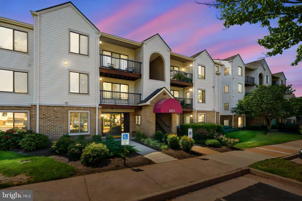 Photo of 8372 Buttress Ln #102, MANASSAS, VA 20110 (MLS # VAMN2011810)