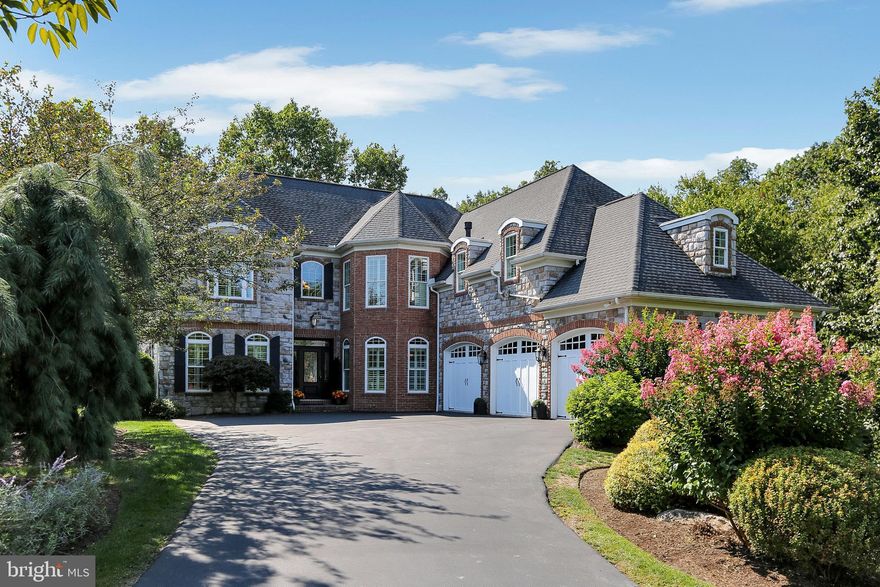 Exceptional Pinehurst Hills Retreat: Elegant, Private, and Spacious.
4200 Sq. Ft .| 5 Bedrooms | 4.5 Baths | 1 Acre Wooded Lot.

Welcome to your dream home in the highly sought-after Pinehurst Hills community in Mechanicsburg! Nestled on a breathtaking, one-acre wooded lot, this 4,200 square foot residence offers the rare combination of luxury, privacy, and natural beauty—perfect for those who value both elegance and tranquility.

Nature Lover’s Paradise:  

Perched above a picturesque ravine with a flowing stream, this home offers stunning views and a true wildlife haven. Imagine spotting deer, foxes, eagles, owls, and more—all from the comfort of your living room or expansive Trex deck. The setting is so serene, you’ll feel like you’re living in a treehouse, with incredible privacy and lush, mature landscaping that requires minimal upkeep—giving you more time to travel and enjoy life.
A private walking path leads you down to the stream, where you’ll discover an open area within the woods—perfect for relaxing or gathering with friends. Here, you’ll find a rustic natural stone fire pit for real wood burning, surrounded by hand-made tree log benches crafted from local trees, creating an authentic, inviting space for unforgettable evenings under the stars.

Outdoor Entertaining at Its Finest:  

Step outside to your backyard oasis, featuring an expansive brand-new deck, a large hardscape patio with a round gas fire pit, and built-in seating walls—perfect for memorable evenings with friends and family. Unwind in the hot tub, surrounded by privacy screens and towering arborvitae, or simply relax and listen to the sounds of nature.

Spacious, Elegant Living

Inside, you’ll find five extra-large bedrooms and four and a half baths, including a luxurious second-floor master suite with dual walk-in closets, and a junior master suite on the main level—ideal for guests or multi-generational living. The stunning dining room features a built-in granite bar with illuminated cabinetry, creating an inviting ambiance for entertaining.
The gourmet kitchen is a chef’s delight, boasting granite countertops, Wolf appliances, a spacious island, and a large walk-in pantry. A dedicated laundry room with washer and dryer adds convenience, while the generous three-car garage with Gladiator storage system offers ample space for vehicles and gear.

Endless Possibilities:  

The walk-out basement offers over 2,000 square feet of unfinished space with soaring 11-foot ceilings—ready to be transformed into your dream recreation area, home gym, additional bedrooms, or whatever suits your lifestyle, even a golf simulator. The lower deck provides even more space for relaxing and wildlife watching.

Prime Location:  

Enjoy the peace and privacy of Pinehurst Hills while being just minutes from major highways, top-rated hospitals, and shopping centers—making your daily commute and errands effortless.

Don’t miss this rare opportunity to own a private, elegant retreat in one of Mechanicsburg’s most desirable neighborhoods. Schedule your private tour today and experience the perfect blend of luxury, space, and low-maintenance living!