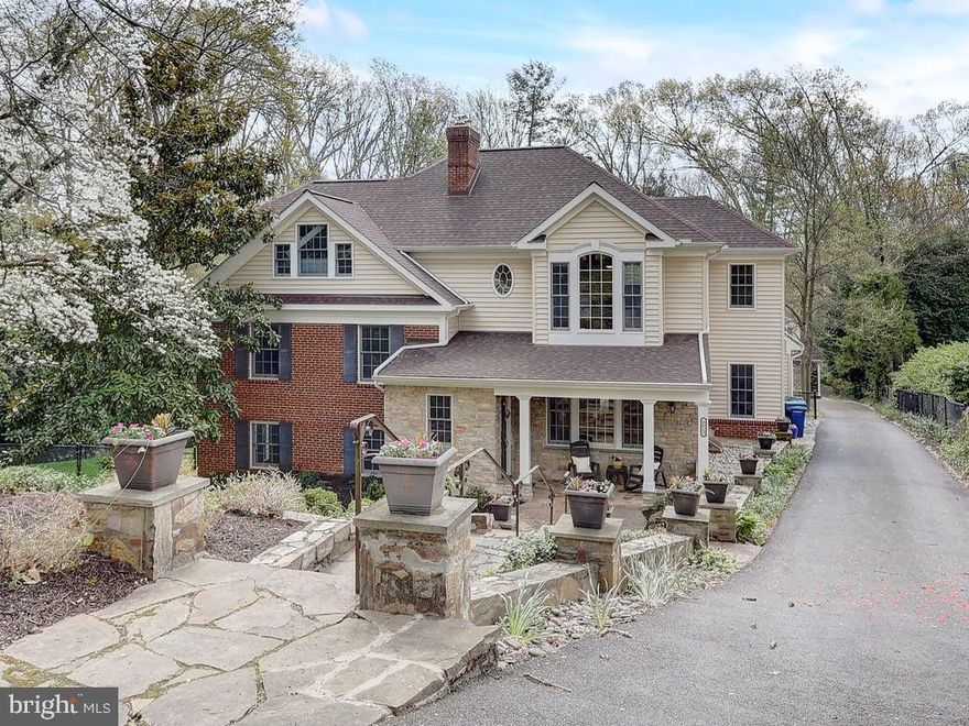 One of a kind, custom designed 5-bedroom, 4.5-bathroom residence nestled in the heart of Springfield on a private 1 acre lot, surrounded by nature.  No HOA and Fantastic location! Boasting $500,000 in high-end renovations since 2019, every inch of this property has been thoughtfully enhanced.  Spanning approximately 4,600 square feet, this home seamlessly combines comfort with functional living space. 
The main level of the home is open concept with kitchen, living and dining areas all open and under coffered ceiling's with beautiful hardwood floors and custom wood moldings.  The kitchen was updated in 2024 and gleams with new quartz countertops, updated cabinet hardware, a large island with built in seating, and newer stainless steel appliances including a 40" dual fuel stove!  Light filled and spacious, the main level also has a beautiful sunroom with deck access, a versatile mudroom, a spacious laundry room/pantry, and a convenient fully renovated and stunning designer full bath.  
One set of stairs lead down to a spectacular wine cellar large enough to hold 400 bottles!  Another set of stairs leads down to the family room featuring a custom bar with 2 taps, beverage/wine fridge, ice maker, all surrounded by gorgeous mirrored shelves with granite countertops and built in sonos speakers. Plenty of room for entertaining! This room is complemented by LVP flooring and a cozy fireplace insert.  Half bathroom with toilet and urinal on this level and walkout access to the lower deck.
There are 3 upper levels.  The first one has 2 bedrooms with hardwood floors and ceiling fans and one full bathroom.  The second upper level is where the large primary bedroom awaits, complete with built in gas fireplace, ceiling fan, massive walk in closet and en suite bathroom with 2 sinks, jet tub, separate shower, heated floors and private toilet. Tastefully done with custom tile and touches.
The third upper level has 2 additional bedrooms, a large full bathroom and a whole house fan.
Other home features :  LED lighting and skylights throughout creating a cozy warm living space.  Gorgeous wood flooring.  Designer blinds on remote in living room and on skylights. Tons of storage space throughout including a full attic on the 2nd upper level and another attic over the mud room.  New roof in 2023! 

Outside, enjoy a stunning professionally landscaped retreat complete with retaining walls, pergola, fire pit, and 12 zone Underground sprinkler system. There is also a multi level expansive Trex deck featuring an amazing outdoor kitchen complete with dual fuel pizza oven, pellet smoker and tap all nicely encased in stone and granite with built in seating.  This is an entertainers dream!   There is a fully fenced backyard and oversized 2 car climate controlled detached garage with a 600 sq ft studio apartment with full bathroom over top!  2 storage sheds behind the garage offer extended storage options.

In addition to the garage there are 4 additional paved parking spots on the upper level off the street.  Additional Info : 50 gallon hot water heater 2018. LL HVAC 2018. UL HVAC 2020. Garage Apt HVAC 2019. Mini split unit in garage (2009), in mudroom (2, both installed in 2020), in wine cellar (2020.)  Location, location, location!!  This neighborhood is tucked away in nature with a country feel but just minutes to 95, 495, 395, Franconia Metro and Springfield Towne Center.  WOW!  Book your appointment today! Rent Back needed through mid-June.