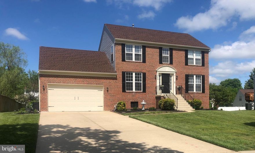 Beautiful Brick colonial in sought after Perrywood!  This home boasts gleaming hardwood floors,  formal dining room and living room which would be a great space for a home office.  The kitchen has granite counter tops,  and ceramic tile back splash, center island and pantry.   The adjoining family room offers a fireplace with mosaic surround.  Enjoy evenings on the deck or patio overlooking the spacious backyard the custom exterior lighting and for pet lovers, there is an invisible fence.  The owner's suite includes vaulted ceilings, large walk in closet,  bathroom with updated vanity and mirror, separate tub and shower.  Finished lower lever offers ample space for entertaining and storage.  The oversized garage has plenty of room for parking and tons of storage with shelving.  Updates include:  Roof/Shingles/Gutters/Screens - 2017, Heating and Air Conditioning - 2014.   Don't miss this one!