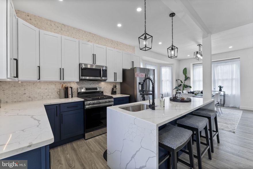 Welcome to 3508 Denison Rd, a 4bd/3.5ba colonial briming with features and charm! This detached home offers a spacious, open floor plan, sizable rooms, a brand new kitchen and private off street parking. The main level is open and enormous and offers a flexible floorplan that is perfect for entertaining. The recessed fireplace with large format tile surround is a focal point and conversation starter. The kitchen is sizable and offers a waterfall quartz island, large shaker-style cabinetry, brand new appliances and accent lighting. The main level is completed with a half bathroom, sunroom that could be a great home office and access to the private rear deck. Upstairs offers two generously-sized guest bedrooms that can easily fit all of your furniture, a large guest bathroom with unique tile work and plenty of storage space. Plus, there is a dedicated laundry room on the upper level, a rarity for the neighborhood. The primary suite is sun drench and offers ample storage space and a private ensuite bathroom with a large walk in shower! The home is completed with a finished basement with a bonus bedroom, full bathroom and plenty of storage. Stop in today, 3508 Denison is sure to impress!