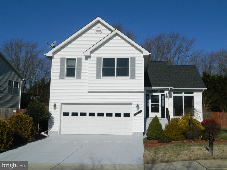 Really nice split level in good condition on quiet street.  3 bedroom 2 bath with upper level laundry room. Nice kitchen with breakfast bar and table space, plus slider off breakfast area to completely fenced, level back yard and large deck. Lower level family room has wood burning fireplace to help keep you warm on chilly winter nights.  Plus two car garage and great landscaping.