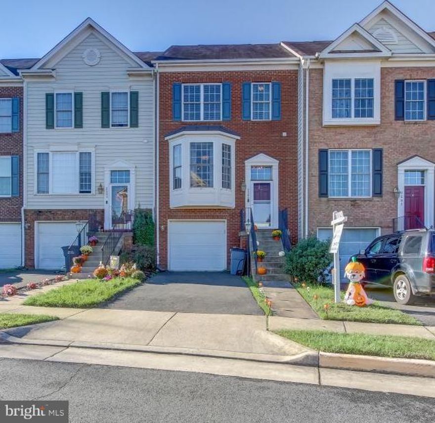 Stylish 3LVL TH w/bumpout & garage! All the space you have been looking for, fenced yard, covered parking+driveway parking, and updates! HW on main & UL, quality laminate on LL = NO carpet. Mstr ste w/sitting rm, sep bath+shower. Main lvl features ample entertainment space, lge kitchen w/granite, SS appl, ample nat light. Finished w/o LL w/lge rec rm & 1/2bath perfect for entertaining or guests.