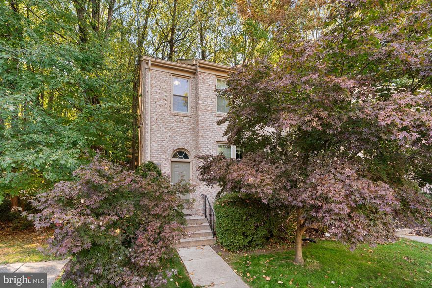 Location, location, location! Classy 3/4 bedroom end unit townhome backing to trees/woods for ultimate privacy! This gem has 3 finished levels including 3 full baths, as well as a half bath, a fireplace,  great deck and patio. Upon entering, you'll be met by wood floors which span the foyer and the entire main level. A few steps up will bring you to a very spacious living room with a triple window and is open to the dining room featuring a lighted ceiling fan. Beyond is a spacious kitchen with updated appliances (electric cooking, but owner converted from gas to electric so easy to revert back to gas) and a pleasant view of trees from the window above the sink - the kitchen has plenty of room to add an island should you desire. The breakfast room is very cozy and allows access via a top-of-the line French door leading to beautiful deck perfect for al fresco dining with a backdrop of trees/nature. The deck has wrought iron railings and convenient stairs leading down to the side of this home! Also, the main level is punctuated with a convenient powder room. Love that this beauty, being an end unit, has two tall side windows as you head to the upper level and is accented with a skylight. The primary bedroom has a vaulted ceiling, a double closet, two windows perfect for enjoying the view and an updated bathroom is nice and bright with a tub/shower. The second and third bedrooms each have vaulted ceiling, as well as lighted ceiling fans. The updated hall bath (within last 5 years) has a tub and this level has a sizable linen closet. The lower level is a home unto itself and is complete with a generous-sized family room has a conveying large mounted tv above the electric fireplace which has the ability to change flame colors (this was converted from gas to electric leaving you with an option to revert back to gas) and rich built-in cabinetry. An oversized French door brings you to a flagstone patio perfect for additional entertaining. This amazing level has a den with window and closet, full bath, separate laundry room with conveying washer and dryer, as well as a large storage room. The windows are approximately 8 years old and the roof is give or take 12 years old - the hot water heater has been replaced as well. ***Schools are Garrett Park Elementary, Tilden Middle, and Walter Johnson High! Short walk to Metro-Grosvenor & Strathmore (1.3 mile drive) and easy access to 270!