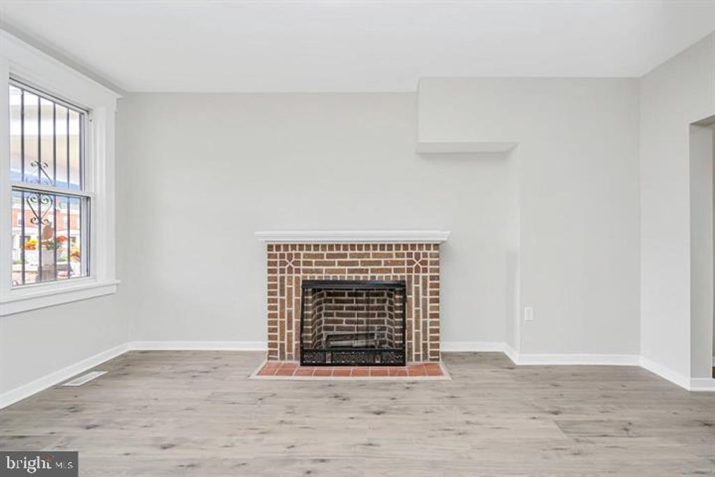 Photo of 2404 W Lafayette Avenue, BALTIMORE, MD 21216 (MLS # MDBA2197544)