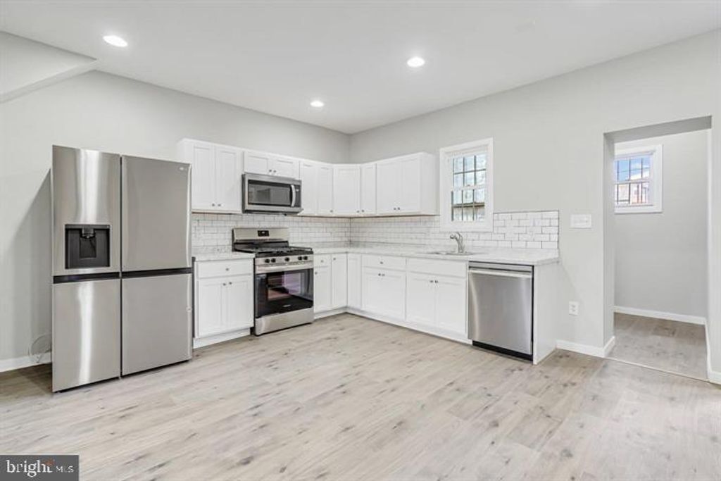 Photo of 2404 W Lafayette Avenue, BALTIMORE, MD 21216 (MLS # MDBA2197544)