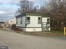 1 bedroom, one bath rental unit. Has central A/C and heat. Has a full bath with shower and a small kitchen. Pets on a case by case basis. No smoking. Sits near Warm Springs Run in a convenient location. Fair Housing Laws apply. Application required.