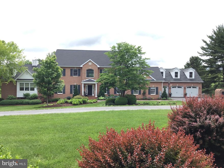 THIS STUNNING, CUSTOM BUILT, ALL BRICK COLONIAL OFFERS EXRTAORDINARY CASUAL LIVING AND GRACIOUS FORMAL ENTERTAINING.  SITUATED ON 3.6  ACRES OF EXPANSIVE YARD SLIGHTLY SLOPING TO  PICTURESQUES FRESHWATER ANTIETAM CREEK. WITH  OVER 7500 SQ FT. THIS HOME IS EXQUISITE FROM TOP TO BOTTOM.  FEATURES: 4 BEDRMS (ROOM FOR  5-6) ,5 FULL +1/2 BATHS. 
OPEN FOYER, GRAND LIVING ROOM, FIREPLACE & CUSTOM OVERSIZED WINDOW FILLS THE ROOM WITH  NATURAL LIGHT & SPECTATULAR VIEW OF ANTIETAM CREEK. CUSTOM BUILT-IN SEATING. WET BAR AND WINE REFRIGERATOR. THE GOURMET ISLAND KITCHEN FEATURES QUARTZIT COUNTERS, TOP OF THE LINE APPLIANCES & AN EFFICIENT WORK TRIAGLE THAT WOUD BE THE ENVY OF ANY CHEF. THE BEST SURPRISE IS THE LG BUTLERS PANTER WITH FLOOR TO CEILING SHELVING, LINEN STORAGE AND SECURED SILVER CLOSET. BREAKFAST AREA WITH FR DOORS TO ONE OF 3 PATIOS &  PLANNING DESK.  FORMAL DINING RM  FEATURES  CUSTOM BUILD-IN,  LARGE SERVING AREA AND WARMING DRAWER FOR EASE OF ENTERTAINING. COZY FAMILY ROOM IS OPEN TO ALL ENTERTAINING AREAS.  THERE  IS A MUD ROOM OFF GARAGE SIDE WITH CABINETS FOR COATS, BOOKS & BOOTS. LARGE LAUNDRY ROOM AND FULL BATH FOR SHOWERING OFF AFTER MORNING JOG! THERE IS EVEN A DOGGIE DOOR!!! THE PRIMARY SUITE IS AMAZING!! SPACIOUS SITTING AREA WITH BUILD-IN & DOUBLE SIDED FIREPLACE. 2 LARGE WALK-IN CLOSETS, PLUS AN "HIDDEN" ROOM FOR OFFICE/NURSERY. THE PRIMARY BATH HAS LG SEPARATE SHOWER, JETTED SOAKING TUB, DOUBLE SINKS AND ROMANTIC GAS FIREPLACE. FR DOORS FOR SUNNING OR ENJOY AN EVENING GLASS OF WINE.
THERE ARE 3  BEDRMS ON 2ND FLR. ONE WAS THE ORGINIAL 'MASTER' WITH ENSUITE BATH .FULL BATH FOR OTHER 2 BEDRMS.  LOWER LEVEL FEATURES  LG RECREATION ROOM WITH ALL THE 'TOYS'  - PING PONG TABLE, POOL TABLE, SECTIONAL SOFA, BAR, REFRIGERATOR, BARN DOORS AND WALK OUT LEVEL FOR  ADDITIONAL ENTERTAINING AREA.  FULL BATH.  EXERCISE RM FULLY EQUIPED, OFFICE AND 2 LARGE STORAGE AREAS .THE GARAGE WING OFFERS A 3 BAY GARAGE, PET WASHING STATION. THE UPPER LEVEL IS UNFINISHED  READY TO FINISH FOR IN-LAW SUITE. GARDEN SHED. PROPANE 3 ZONED HEAT. CAC. HOA $495 YR. INVISIBLE DOG FENCE. PROFESSIONALLY LANDSCAPED.
THIS AMAZING PROPERTY HAS 3.6  ACRES BORDERING ANTIETAM CREEK. EXPLORE IN A KAYAK OR GO TUBBING DOWN THE CREEK ON A HOT SUMMERS  DAY. GREAT AREA FOR PICNICS AND SUMMER ENTERTAINING. THIS IS AN OUTSTANDING PROPERTY 1ST TIME  OFFERED FOR SALE. DO NOT MISS THIS  OPPORTUNITY TO ENJOY QUALITY OF LIFE IN THIS ONE-OF- A- KIND DESIGNER PROPERTY, IT IS BOUND TO CHECK ALL YOUR BOXES!! QUALIFIED BUYERES ONLY!!