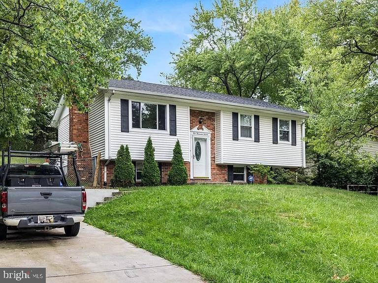 Ready for new owners. Split Foyer, Living Room, Dining, and hallway on main level offer hardwood floors. Kitchen with eat-in space and a door leading to your large deck. The brand new driveway (6/2022), roof (2021), HVAC 2021, and freshly painted throughout (5/2022). The lower level offers a large family room with two additional bedrooms and a full bathroom. Perfectly situated and convenient to everything, just minutes to U of MD, Greenbelt Metro, MARC, ICC, I-95, Route 1, NASA, USDA, Ft. Meade, Andrews and Bolling AFB/Joint Bases, Washington, DC, multiple shopping areas/plazas, entertainment, restaurants, grocery stores, bus/shuttle stops, farmer's markets, and recreation! There are also numerous walking and biking trails around the community.