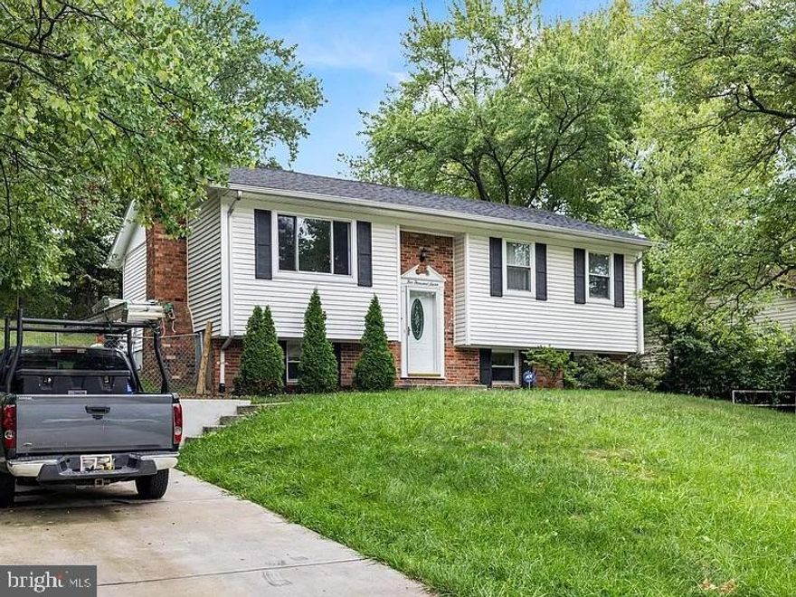 Ready for new owners.  Split Foyer, Living Room, Dining, and hallway on main level offer hardwood floors. Kitchen with eat-in space and a door leading to your large deck. The brand new driveway (6/2022), roof (2021), HVAC 2021, and freshly painted throughout (5/2022). The lower level offers a large family room with two additional bedrooms and a full bathroom. Perfectly situated and convenient to everything, just minutes to U of MD, Greenbelt Metro, MARC, ICC, I-95, Route 1, NASA, USDA, Ft. Meade, Andrews and Bolling AFB/Joint Bases, Washington, DC, multiple shopping areas/plazas, entertainment, restaurants, grocery stores, bus/shuttle stops, farmer's markets, and recreation! There are also numerous walking and biking trails around the community.