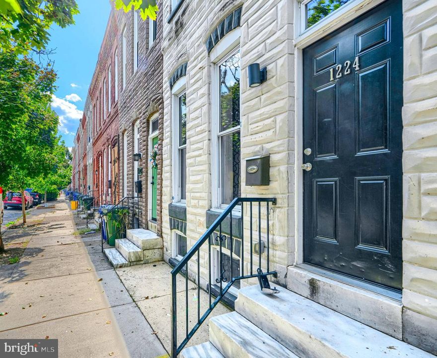 Welcome to this spacious 1,800 sq. ft. rowhome located in the vibrant Washington Village/Pigtown neighborhood of Baltimore City.  This property combines modern updates with a versatile layout—perfect for working from home, sharing with roommates, or accommodating families.  Location is key...Enjoy the vibrant city lifestyle with walkability to M&T Bank Stadium (Ravens), Oriole Park at Camden Yards, and so many exciting venues, restaurants, and entertainment spots along with Univ of MD, Downtown Business District.  Commuters routes to north or south of the City are easily access via I-95, I-695,I83 and public transportation. The main level features a generously sized room currently configured as a living room and dining area. This space is perfect for entertaining or winding down after a long day. The recently renovated kitchen showcases quartz countertops, a decorative backsplash, stainless steel appliances, and direct access to the rear alley. A convenient main-level laundry room and half bath add to the functionality. Upstairs, the primary suite offers ample space with an ensuite bathroom. The front bedroom provides additional comfort, while the expanded middle room offers versatility as a third bedroom, office, exercise room, or flex space, with two closets for abundant storage. The lower level houses the home’s utilities and provides excellent storage space. With its ideal location, modern upgrades, and spacious floor plan, this home is a rare find in Pigtown!