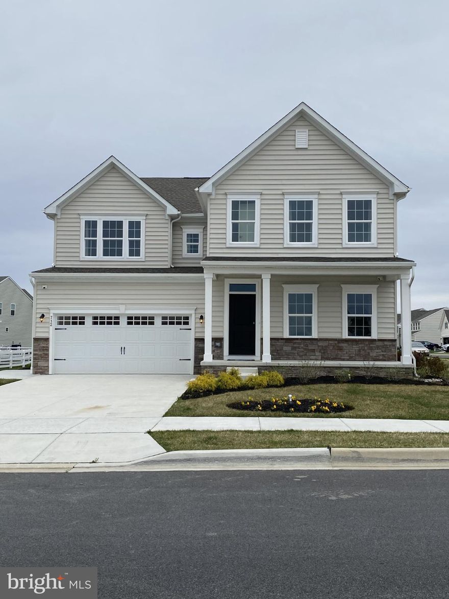 EXTREME PRICE IMPROVEMENT! Motivated Sellers! Be the lucky one to OWN this previous MODEL HOME and move in before Holiday season. Welcome to 712 Wallasey Drive! This beautiful 3 years young home by Ryan Homes is located in Middletown, Delaware, in the popular Preserve at Deep Creek. 712 Wallasey Dr is in the sought out Appoquinimink School District, conveniently located off of 301. You can enjoy this spacious new construction, with all the bells and whistles of a model home. This Seneca model offers 4450 square feet of living space with three gorgeous levels, boasting a finished basement with a full bathroom on a great lot. As you drive to the house, you are greeted with a beautiful upgraded front elevation, lovely landscaping, and a full size porch. As you enter the foyer, you will find a spacious study/office on your right and a  powder room.  As you continue your tour, you'll find that the home opens up to a big open family entertainment space – complete with a comfortable dining room, a warm family room, an expansive kitchen with a huge island, and another beautiful dining area. The entire first level has upgraded LVP flooring. You will love the white on white modern kitchen featuring quartz countertops, plentiful 42” crown cabinetry, updated hardware, new light fixtures, stainless appliances, gas cooking, vented out hood, a large island, an eat-in dining area, and a walk-in pantry. From the kitchen, you can walk out to a large, accessible, no maintenance deck and leveled lot, perfect for entertaining and for outdoor gatherings. The huge family room has a gas fireplace to keep you warm and cozy in all seasons. By the side of the family room, you'll find a convenient  garage entrance which has an arrival center for all your accessories. From the family room, take the stairs to the second level where you'll find the enormous primary bedroom with a luxurious en-suite, featuring a large tile shower and two walk-in closets. You will have plenty of room for your family with three additional bedrooms, two of which share a Jack and Jill bath and a third, potentially a guest bedroom, that offers an en-suite bath. All bedrooms have walk-in closets, all bathrooms have easily maintained and aesthetically pleasing tiled floors. There is also a spacious center loft in this level for upper level entertainment. Upper level laundry completes the tour of second level. The finished lower level has three different entertaining areas for family to enjoy different activities. This gorgeous basement also has a full bath with finishes similar to the stylish bathrooms upstairs. There is a good size unfinished section in the basement for all your storage needs. All three levels have ample recess lighting and plenty windows to keep your home bright yet cozy. Other special features unique to this house are side entrance door for the garage, irrigation system for your lawn. Carrier HVAC system with two zone thermostat and tankless water heater are features that are done with  functional convenience in mind. Schedule your tour today. House comes with no furniture. Pictures give idea of the size and furniture option visualization. Any questions contact listing agent.