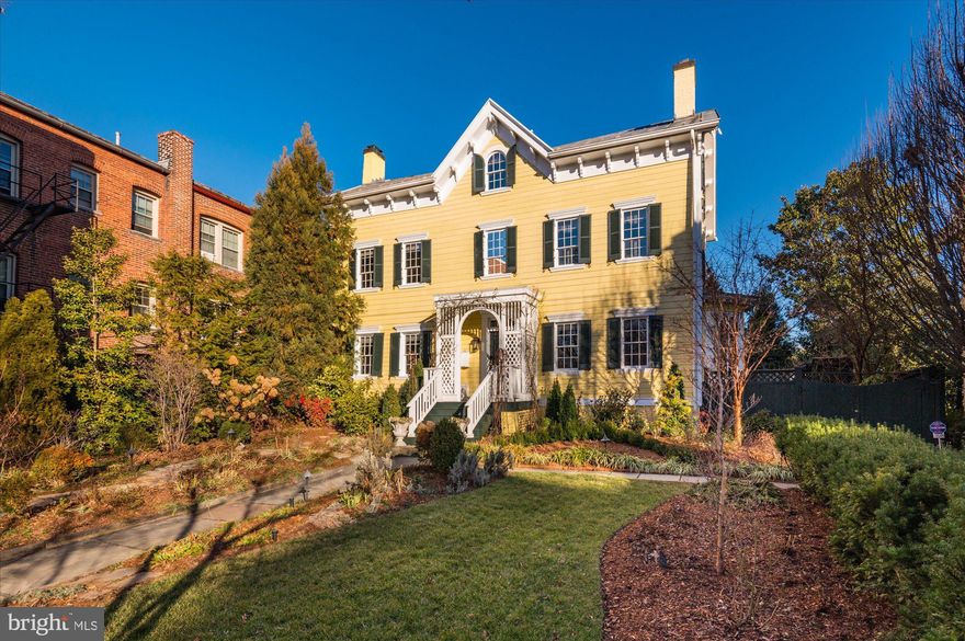 (PROPERTY LISTED BY WFP AGENTS KIM GIBSON AND CYNTHIA HOWAR.)

The “Medley-Sewell” House, built in 1800, at 1545 35th Street, is the much-admired iconic yellow farmhouse which sits high above the street in the west village of Georgetown on an exceptionally large and well-landscaped lot. A “once in a generation” offering, this fully detached frame home has tall ceilings, abundant natural light, and the charm and graceful formal proportions one would expect in an important and historic home.

Highlights include a double parlor Living Room with two fireplaces and custom built-ins, a formal Dining Room with fireplace, a large eat-in kitchen/family room, 6 Bedrooms, 4.5 Baths, 6 fireplaces, a 32-foot swimming pool and parking for 3 cars.  The house works well for both family living and gracious entertaining and is a “gardener’s delight”. This exceptional property has been lovingly cared for and improved by the current owners and is unlike anything on the market today.
