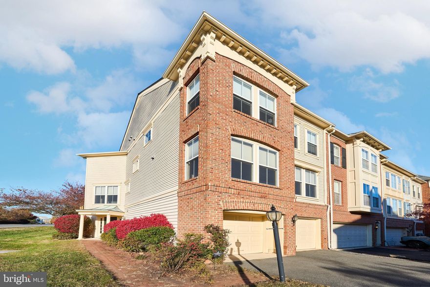 42464 Regal Wood Dr, Brambleton VA 20148 — Renovated Luxury End Townhome
Welcome to this luxuriously renovated end-unit townhome offering 3 bedrooms, 3.5 baths, and a 2-car garage, perfectly situated across from the Brambleton Town Center. With approximately 2,532 sq ft of beautifully finished living space, this residence showcases modern upgrades, thoughtful design, and a premier location in one of Loudoun County’s most desirable communities.
Step inside to discover a bright open-concept main level featuring gleaming hardwood floors, designer lighting, and spacious living and dining areas ideal for entertaining. The gourmet kitchen is a true showpiece—equipped with GE Café stainless steel appliances, Corian countertops, a large center island, and abundant custom cherry cabinetry. The French-door GE Café refrigerator with integrated beverage center dispenses hot and cold filtered water as well as cubed and crushed ice, blending function with luxury.
The primary suite offers a peaceful retreat with a spacious walk-in closet and a spa-inspired en-suite bathroom featuring dual vanities, a soaking tub, and a separate shower. Two additional bedrooms are well-sized and share a beautifully appointed full bath. The fully finished lower level provides a versatile recreation area, a third full bath, and a separate utility room with entry through the garage, making it ideal for guests or a home office.
Enjoy everyday convenience and style with a covered front entryway, fresh interior paint, and modern recessed lighting throughout. This home also comes with FIOS 500/500 broadband, Verizon Fios HD Extreme Package, and router service included in the HOA fee, ensuring seamless connectivity.
Outside, relax or entertain on your private patio and enjoy easy access to Brambleton’s premium amenities—including pools, fitness centers, parks, playgrounds, walking trails, tennis courts, and community events. The low monthly HOA (approximately $212) covers broadband service, snow removal, trash, and exterior maintenance, delivering low-maintenance living at its finest.
Perfectly positioned near Legacy Elementary, Brambleton Middle, and Independence High School, and just minutes from shopping, dining, theaters, and major commuter routes, this stunning residence blends luxury, convenience, and value in one of Northern Virginia’s most vibrant neighborhoods.
✨ Every detail has been thoughtfully designed—move right in and enjoy the Brambleton lifestyle at its best!