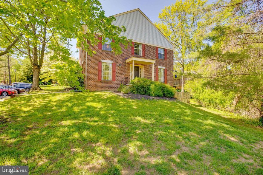 This is an end unit that you won't want to miss! Tucked away in peaceful Loveton Farms and still close to all of the amenities of the Hunt Valley Town Centre and 83. The entryway makes a great impression with the two story open staircase. The living room features hardwood floors, beautiful built-ins, a wood burning fireplace, and ample natural light from all of the windows. Pass by a convenient half bathroom on the way into the eat-in kitchen. There is ample storage space between all of the cabinets in the kitchen along with a lovely built in desk convenient for Zoom calls, homework, or a coffee nook! The kitchen opens right into the dining room with hardwood floors and a patio door leading to the deck. The three spacious bedrooms upstairs feature soaring high ceilings along with carpet throughout. The primary bedroom has a ceiling fan along with an en suite bathroom. The lower level is full of space to have a family room or any sort of additional hang out space. There's a convenient wet bar along with a second fireplace, a second half bathroom, and a good bit of storage. The lower level walks right out to the backyard which is full of beautiful mature trees. The deck is a great space to dine al fresco as the evenings warm up this spring! Schedule your showing today before it's gone!