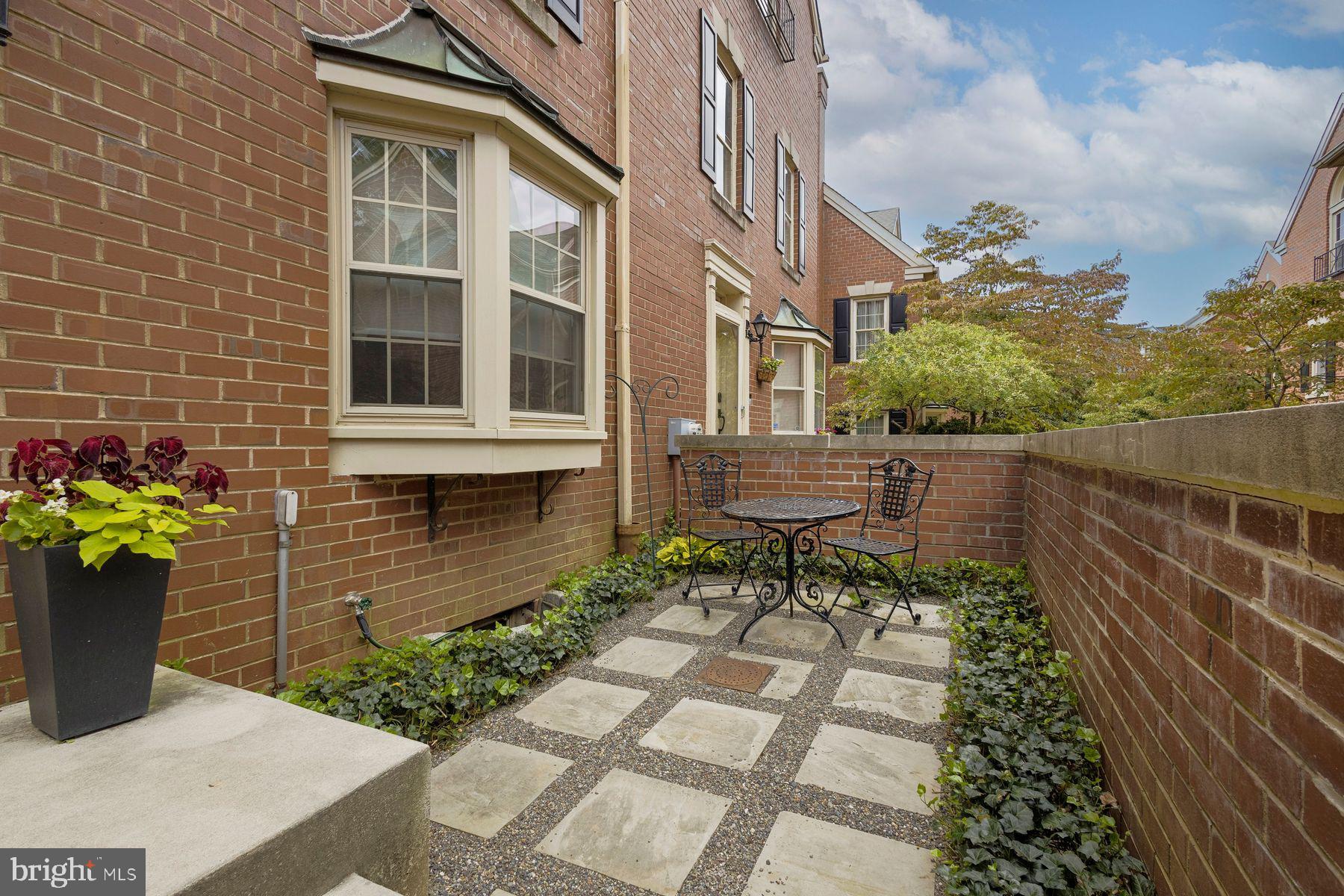 Welcome to the highly sought-after Tavistock community in the heart of Chestnut Hill. This rarely available and effortlessly charming townhome is nestled within a serene, village-like setting, offering a turn-key opportunity at 8708 Prospect Avenue, Home D14. This beautifully updated 3 bedroom, 2.5 bath townhome built in 1990 spans 1,826 square feet, offering character and contemporary comfort in equal measure.
A private front patio welcomes you to this thoughtfully renovated (2018), move-in ready home featuring an open, light-filled floor plan with fireplace, professionally landscaped yards, and quality upgrades throughout. The main level features designer flooring, upgraded lighting, smart home features, and an Andersen sliding door. The expanded and redesigned kitchen offers high-end cabinetry with custom storage, quartz counters, GE Café appliances, induction cooktop, dual ovens, an oversized farmhouse sink with Delta touch faucet, and stylish details like under-cabinet lighting. The second level offers a fully renovated bath with marble-top vanity and tiled shower, new Shaw carpet and porcelain flooring, room-darkening shades, and an expanded laundry area with added cabinetry, recessed lighting, and a Fischer & Paykel washer and dryer. The third-level primary suite features a custom closet and a renovated bath with marble-top double vanity, enlarged marble-tiled shower, Kohler comfort-height toilet, recessed lighting, wall sconces, a Hunter ceiling fan, and custom room-darkening shade.
Home D14 includes an unfinished basement (rare in Tavistock) for storage or future expansion, with upgrades like a new water heater (2020), electrical panel, sump pump, and waterproofing (2022). Assigned parking and guest spots provide convenient off-street parking.
This Chestnut Hill charmer is just steps from quaint shops, acclaimed restaurants, the scenic Wissahickon Trail, and with easy access to Center City Philadelphia, Manhattan and Washington, D.C. via train. Don’t miss the opportunity to make this gracious home your own; where comfort, style, and a vibrant community come together to offer a truly unparalleled living experience.