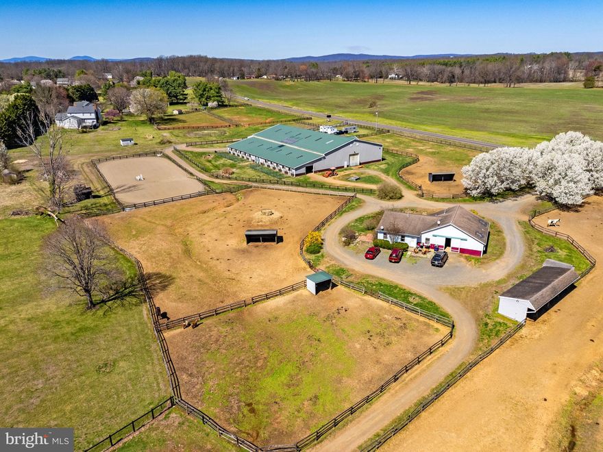 This is what equestrian dreams are made of  - whether you're looking to develop your own professional program, invest in an income producing property or simply keep your horses at home, this is the facility you've been looking for!!  Ideal location on 33+ acres in the heart of horse country (Fauquier County) easily accessible for those boarding/training and coming from Northern Virginia/DC.  Highlights of the equestrian facilities include 15 stall center aisle barn with wash stalls, tack room, feed room, half bath/laundry, hay loft & interior access to the 80 x 152 indoor riding arena with lighting and professional footing.  Attached to the indoor is a climate controlled viewing lounge/office with kitchenette - perfect to monitor lessons, training, clinics or host gatherings.   Enjoy riding in the 100 x 200 outdoor ring with all weather footing.  There is a 3 stall barn  with wash stall & tack room attached to a 3 bedroom/1 bathroom guest/tenant house - could be used for additional income or to house barn/farm help.  Your horses will benefit from 9 paddocks several with run in sheds, board fencing & automatic waterers.  Additional amenities include a round pen, stocked pond, grassy field to hack or practice cross country jumping, RV hook-up with dump station, ample trailer and vehicle parking & so much more.   The 2500++ sq ft main residence has its own private entrance & with 4 bedrooms, 2.5 bathrooms  & 3 car garage/expanded driveway, you'll enjoy farm life & entertaining.  Open floor plan with gourmet kitchen.  Huge mud/laundry room on the main level.  Fully finished walk-out lower level - could almost double as an apartment with separate entrance.  Both homes have emergency generators so you'll never be without power.  Just 10 minutes to Warrenton, 20 minutes to Culpeper, 30 minutes to Marshall/The Plains, 45 minutes to Middleburg/Upperville  & an hour to Washington DC , this is a not to miss opportunity!!