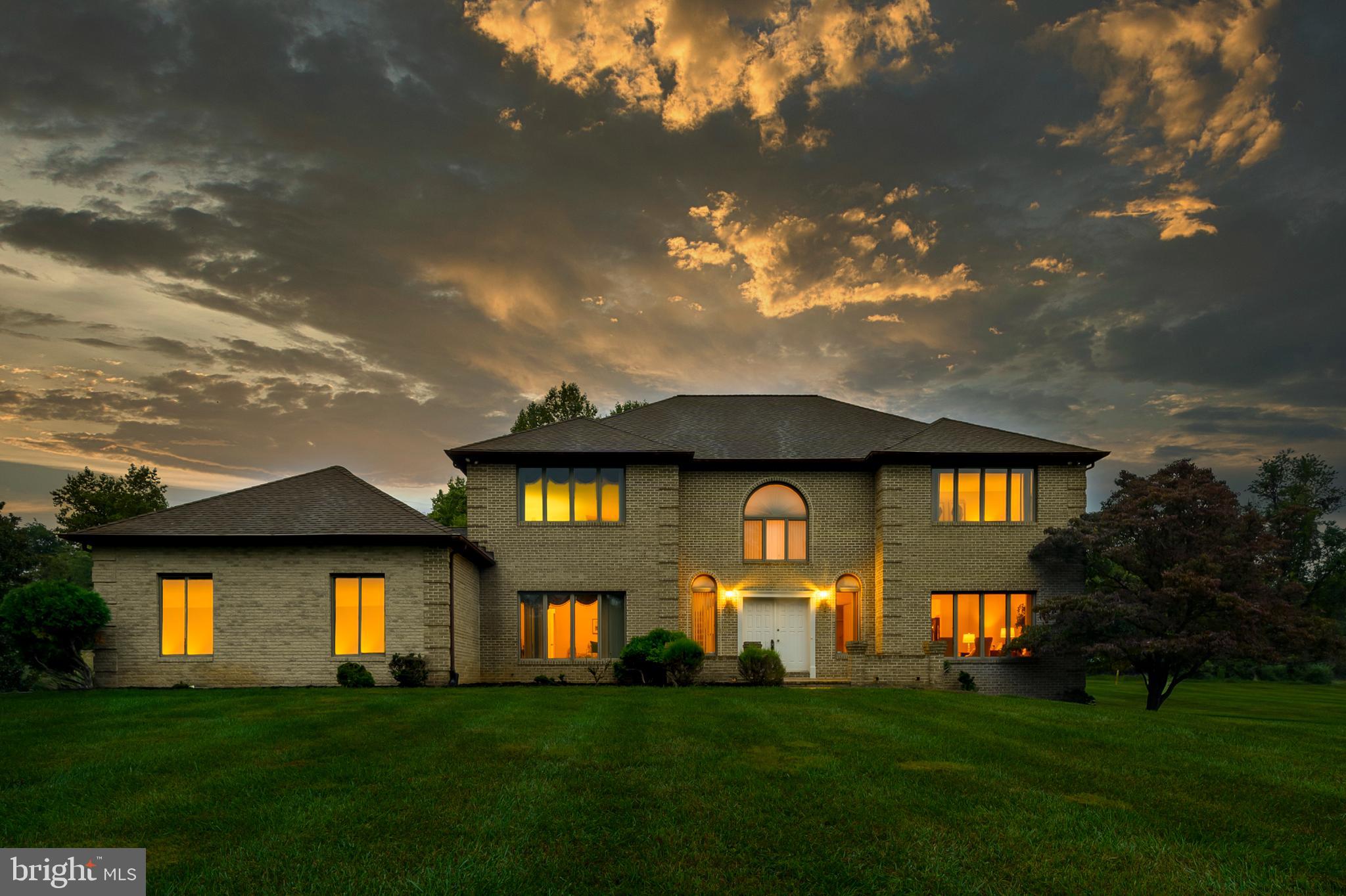 Coming Soon! Beautiful custom home in The Woods community in Owings Mills has over 6000 sq ft of living space. You will love the spacious floor plan throughout the house. Starting with a large open kitchen /family room layout on the first floor. An office/extra bedroom with attached full bath, two story foyer, powder room, laundry room, formal living and dining rooms complete the main level. Up the staircase to the second-floor landing, you will find a primary suite that spans an entire side of the house, with a huge bathroom with jetted tub, shower, double vanity, bidet and toilet. There are 3 closets (2 are walk-ins), as well as, a dressing area with mirror. There are 3 more spacious bedrooms and a large full bathroom with shower and jetted tub. The lower level has been finished and is over 2,200 sq ft of space for you to make your own. There is a kitchenette with refrigerator. Plenty of room for ping pong, pool, exercise equipment, home theatre, gaming room, whatever you can imagine. Large windows throughout the house let in lots of light and make this house feel like a home. The house sits back off the road on a large, flat, open lot over 1.8 acres. You are just minutes away from Hunt Valley, I-83, the Falls Road corridor and Greenspring Ave. Enjoy the feel of the country and be so close to all the comforts. Come and see this lovely home and fall in love!