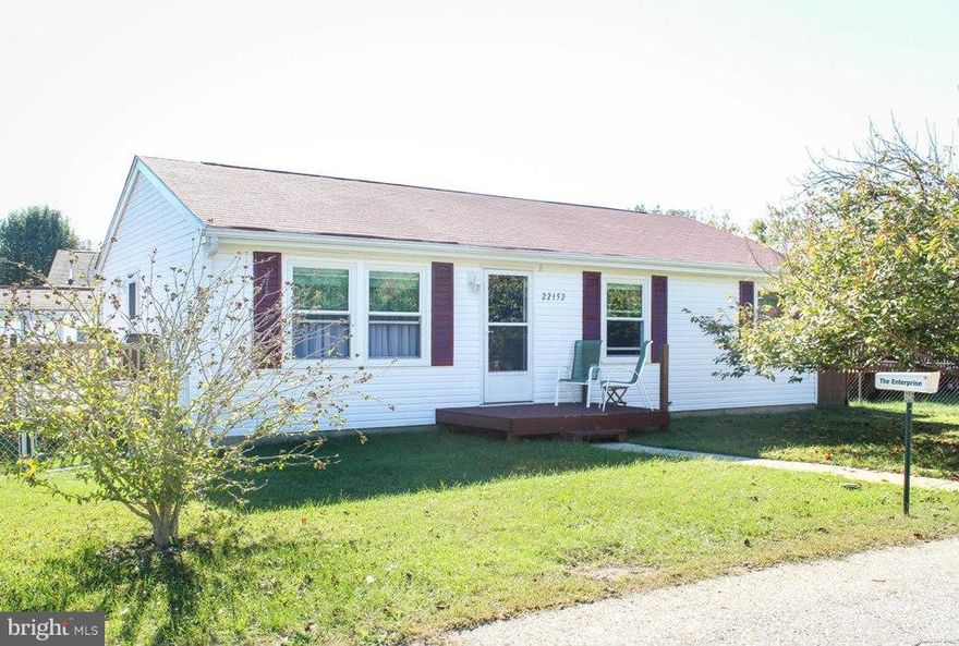 CLEAN! CLEAN! CLEAN! Meticulous home here! Hardwood flooring, walk in master closet, newer carpet, newer roof and windows. Deck, fenced in back yard. Amish built 10x16 shed with a loft. Convenient to shopping and to Pax River NAVAIR.  Home Warranty included.  Don't pass this one up.  Move in ready!