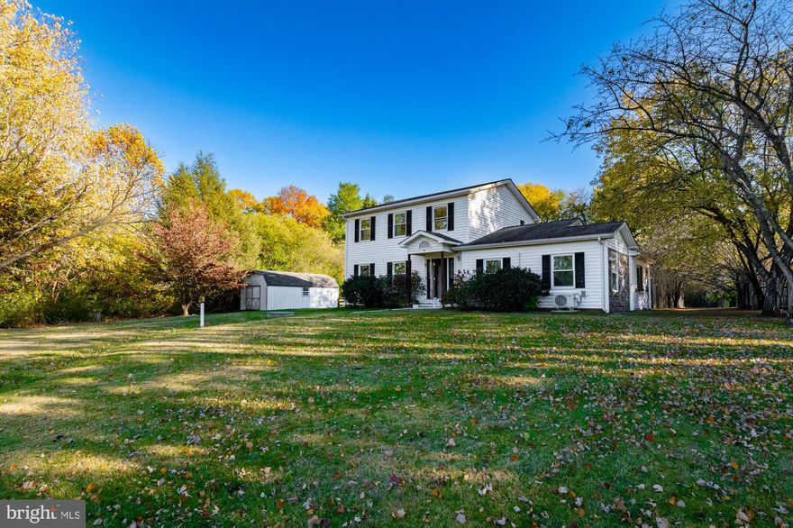 Now is YOUR chance to own a beautiful piece of property on 2.5 acres in charming Knoxville. This beautiful colonial has just undergone several updates to get it ready for the market. Situated on a slight knoll with beautiful views of open land, mature trees in every direction, including weeping willows and fruit trees. Perfect for the micro farmer, baker and chef who wants to have their own chickens, bees and vegetable garden. A spring fed stream runs through the front of the property as you drive up the long treelined driveway to the house. 
**Formal living room and dining room with hardwood floors, Charming country kitchen with new LVP flooring opens up the family room. **There have been two additions made to this property since initial construction:  a four-season sun room that was added in 2007 with French doors, the garage was converted into a main level bedroom in 2021.  **Upstairs, all the carpets were just replaced. The owner suite has a private en-suite bath, and there are two additional bedrooms with shared hall bath. All three bathrooms have just undergone complete renovations, including new vanities, lights, commodes and new glazed tile surrounds and tubs. **The large basement with direct access to backyard has possibility for more finished square footage. Bring your ideas to life! **NEW SEPTIC FIELD IN DEC 2020, NEW WELL PUMP IN 2021, NEW HVAC FOR THE MAIN HOUSE, AND BRAND NEW HVAC FOR THE NEW ADDITION IN 2025!!! WELL WATER QUALITY TEST PERFORMED IN FEB 2025. **Brunswick/Knoxville is a wonderful place to live. Close to the MARC train and highways for easy commuting, yet you're in a completely quiet rural setting. Close to bakeries, restaurants and grocery store and shops. Othello Recreation Park is gorgeous addition to the community, full of ballparks and recreational opportunities. Enjoy walking or biking along the C&O Canal and Towpath. Harpers Ferry National Park is just a few minutes away, as are several wineries. Don't miss your chance to own this special piece of property!