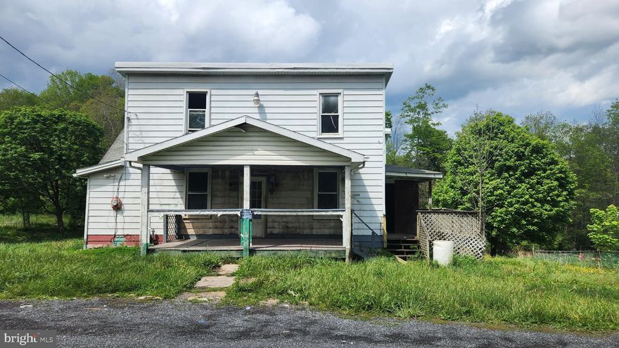 Two story house on  0.4 acre lot outside the city limits of Frostburg.  This is a Fannie Mae HomePath property.
