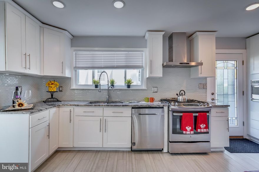 Beautiful and renovated 5 Bed / 3 Bath single family house, this is one of its kind with a full accessory apartment with  1bed, full bath,  family room  , laundry room.  Hardwood floor throughout the house, Baths exquisitely renovated, huge sunroom,  SS appliances, granite counter top, It is a very convenient location.