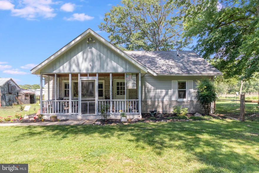 Recently renovated and cute as a button...1 level home with 3 bedrooms, 2 full baths.  Newly painted, hardwoods refinished. Has separate laundry/pantry combo, large eat-in country kitchen, mud room, plus updated baths. Brand new heat pump, new central a/c, very efficient; new water heater. Has both Living & Family rooms and wood burning fireplace.  Idyllic on 3 acres - backs to farm.  Cozy screened front porch!  Early 1900's barn is very sturdy has great workshop potential with concrete flooring, plus spacious loft.  New fencing, large shed.  Nice yard for the kids and pets to play.  Nicely landscaped, mature trees, Oak, Maple, Elm, Mulberry.  Bring your animals! Skippy, our 17 yr old Paint is there to greet you...needs loving home. One mile to Rt 3 for commuting to Fredericksburg, I-95, Quantico, Culpeper. 2 minutes to Locust Grove and Army Training Center.