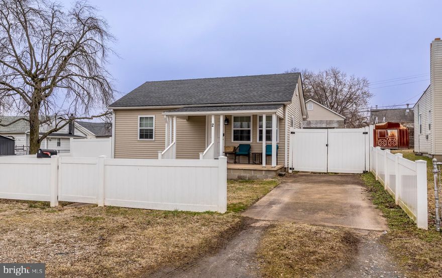 Adorable one-level bungalow in Middle River  has a inviting layout of 2 bedrooms and a den that could be used as a third bedroom.  This home has rich wood-looking vinyl floors through out.  The kitchen is an open-concept with granite countertops and stainless  appliances. It's truly a full quality renovation. HVAC, roof, appliances, 200 amp service, Brand new fencing around property. Very unusual to find a 2 bath with an oversized garage at the price point. New kitchen cabinets, beautiful granite countertop. Also granite in the main bath. New windows with lots of natural light throughout the home.  Master is nice size. Terrific new patio and conrete deck, just in time for spring and summer parties. 5 additional parking spaces out front as well as a private driveway. To top it off it's on a dead end street. Don't miss this one.