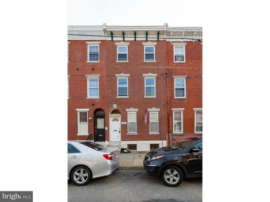 Duplex in amazing Fishtown location. Opportunity to update. Beautiful 3 story brick facade with original cornice, and arched transom entrance. Formal common entry foyer with original tile threshold. 1st floor: 1 bedroom, and 1 bath has access to the large basement and the rear yard. This apartment includes wall to wall carpeting, a rustic kitchen with plenty of natural light and ample closet space. Range included. The 2nd floor bi-level can be a 3 or 4 bedroom. Hardwood in the living room and large bay window allows a lot of natural light. Rustic kitchen is open to the the living room. There is a hall full bath with standing shower, original subway tile and pedestal sink. There is a living room and potential 3rd bedroom on this level. The 3rd floor has 1 large bedroom. Radiator heat, gas cooking, separate utilities. Some TLC is needed but the location makes this duplex a rare and awesome find! This is a legal duplex. We welcome your visit today.