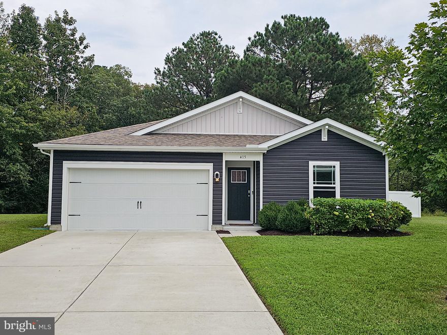 Completed in 2021 by DR Horton, this inviting four-bedroom, two-bath home blends modern design with everyday comfort in one of Salisbury’s most convenient locations. An open floor plan highlighted by luxury vinyl plank flooring flows throughout the main living spaces, creating a bright and welcoming atmosphere.

The kitchen and living areas are thoughtfully designed for both daily routines and entertaining, while two full baths feature contemporary finishes for comfort and style.

Step outside to enjoy a private fenced backyard, framed by a classic white fence and perfect for relaxing, gardening, or gathering with friends. Beyond the yard, a tranquil pond view adds a peaceful backdrop to your days.
This quiet community feels tucked away yet offers quick access to everything Salisbury has to offer. Just minutes from the Route 13 Bypass, the home provides an easy drive to local restaurants, shopping, Salisbury University, and the hospital, while Ocean City, and Assateague Island are within a short trip for weekend escapes.
With its modern construction, thoughtful layout, and prime location, 415 Creekside Trail is the perfect retreat that keeps you connected to it all. Schedule your private showing today.