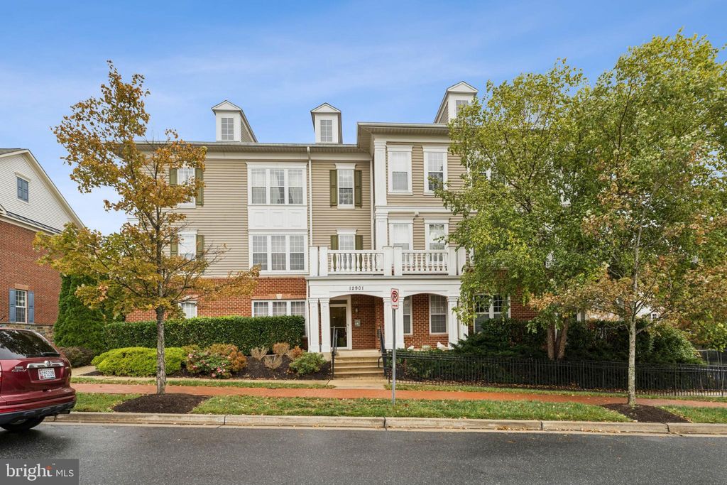 Photo of 12901 Clarks Crossing Drive #102, CLARKSBURG, MD 20871 (MLS # MDMC2204046)