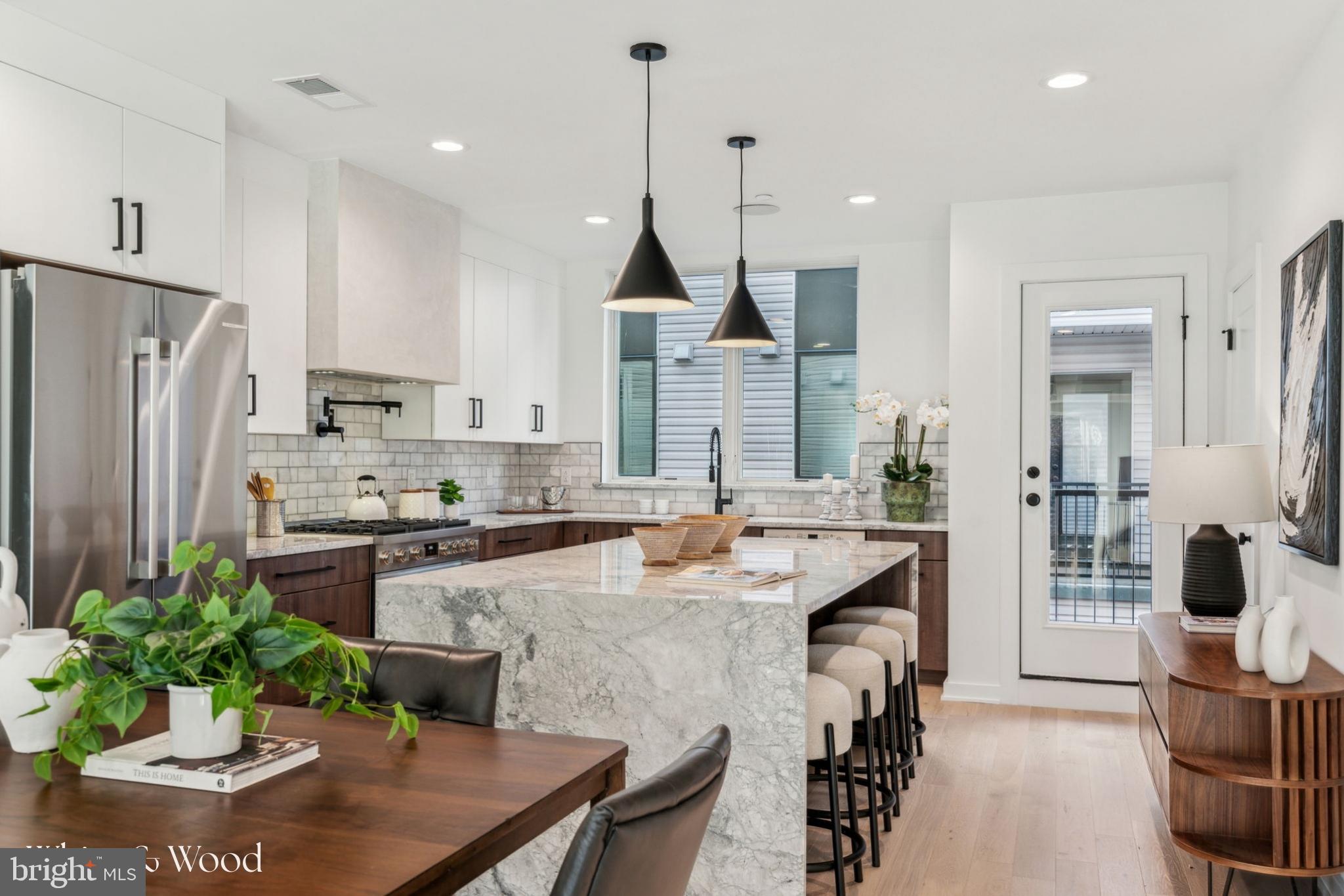 Welcome to Wendle Place Phase 4—a rare opportunity to design your dream home in one of Philadelphia’s most sought-after new construction communities. For a limited time, buyers will have the ability to personalize select interior finishes, including cabinetry, tile, flooring, lighting, and bathroom fixtures. Customize your home to match your taste, all while enjoying the confidence of working with an experienced development team and curated materials that maintain design integrity.
Phase 4 residences offer the same premium layout as prior Phases 1 & 2, with a dramatic split level living area with soaring ceiling heights, 3 bedrooms, 3 full baths, 2 half baths, a 2 car garage parking, multiple outdoor spaces, and a private rooftop deck with green roof. Every home includes the full 10-Year Tax Abatement and a 1-Year Builder’s Warranty.
Nestled along the beautifully tree-lined 6th Street in the heart of Northern Liberties, Wendle Place is in a prime location just steps from some of the neighborhood’s most iconic destinations—Bardot Café, Café La Maude, and Liberties Walk—offering unmatched access to dining, shopping, bike trails, and public transit. Developed by Catalyst City Development and designed by Gnome Architects, the project seamlessly blends modern design with timeless craftsmanship.
Phase 4 homes are estimated for delivery in Spring 2026. Custom selections must be finalized by December 2025 to meet the build timeline. Don’t miss the chance to create something uniquely yours at Wendle Place. **Taxes are not $0, however, homes do come with an approved 10 Year Tax Abatement.* Ask about our financing options with preferred lender.*
