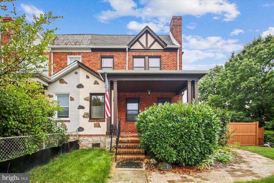 The one you have always admired! This charming Tudor duplex is beautifully landscaped and has been lovingly maintained and updated by the same owner for 40 years! Featuring gorgeous inlaid hardwood floors in the spacious living and dining rooms, an updated kitchen with custom solid wood cabinetry that is open to the dining room, and rear sunroom/office space that has a walk-in tub ( potential for a 3rd bath?) Upstairs are three generously sized bedrooms (also with wood floors) and an updated hall bath. The partially finished walkout lower level offers a large open recreation area/family room, and an additional full bath. Original hardwood flooring throughout, fresh paint, new water heater, a large Amish shed and a second shed in the fantastic rear yard with recently installed vinyl fencing. All of this and a glorious southern exposure that floods this home and garden with afternoon sunlight makes this a must see! Located in the Waltherson neighborhood, convenient to trendy Lauraville and Hamilton shops and restaurants, I-95, and a quick commute to Towson, JHU or Downtown!