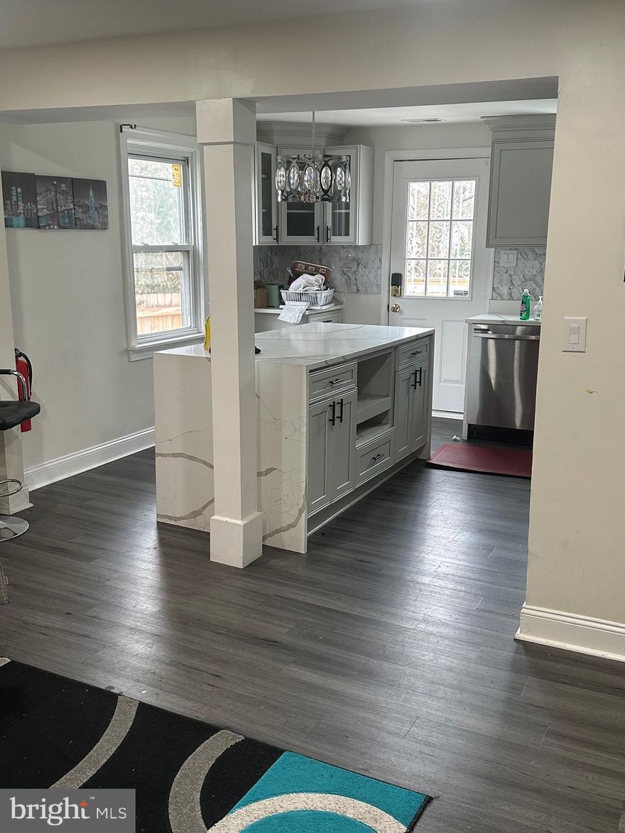 Freshly remodeled 4-bedroom, 2.5 bath residence featuring a spacious open layout and contemporary finishes throughout. The main living and dining spaces connect seamlessly to a sleek kitchen complete with granite countertops, stainless steel appliances, and a striking waterfall island with seating.
Enjoy a fully fenced backyard with a deck perfect for entertaining, plus a storage shed for extra convenience. Located close to Walker Mill Regional Park and the Capitol Heights Metro Station for easy commuting.
Move in ready and ideally situated!